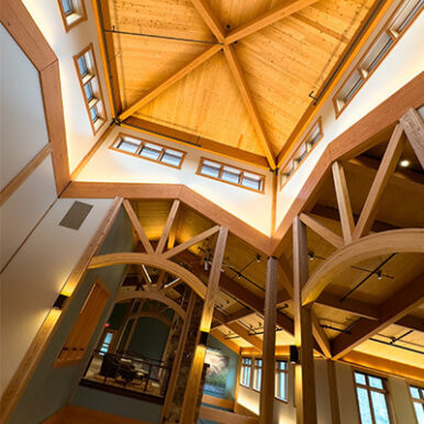 Interior rendering of the Usona building atrium. Featuring large open space will wood architectural features.