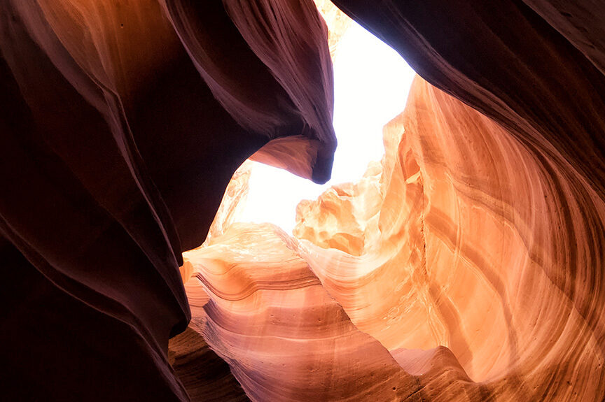 Light shinning through an opening of a rock structure